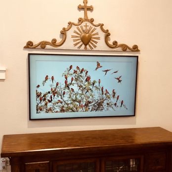 55 inch Samsung Frame TV displaying art above sideboard in South Austin TX